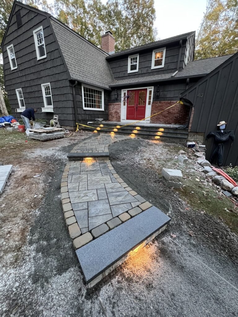 After: paver entry walkway and steps with step lights in Canton, CT
