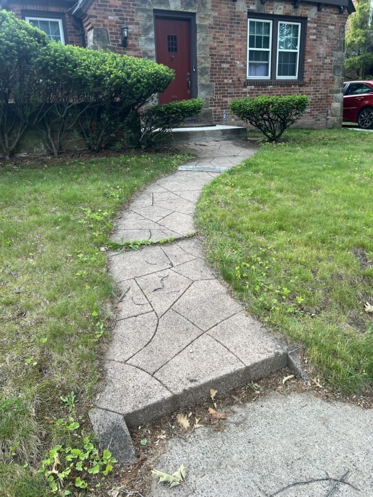 Before: cracked concrete front walkway in New Haven, CT
