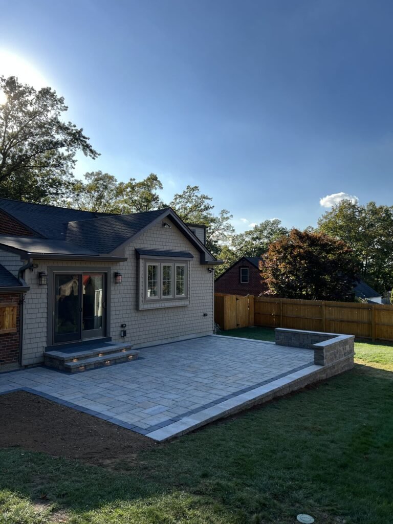 Paver patio with a built-in seat wall in Wallingford, CT