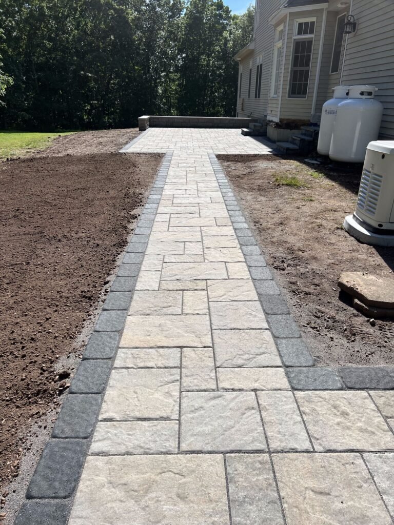 Paver walkway with a contrasting border in Killingworth, CT